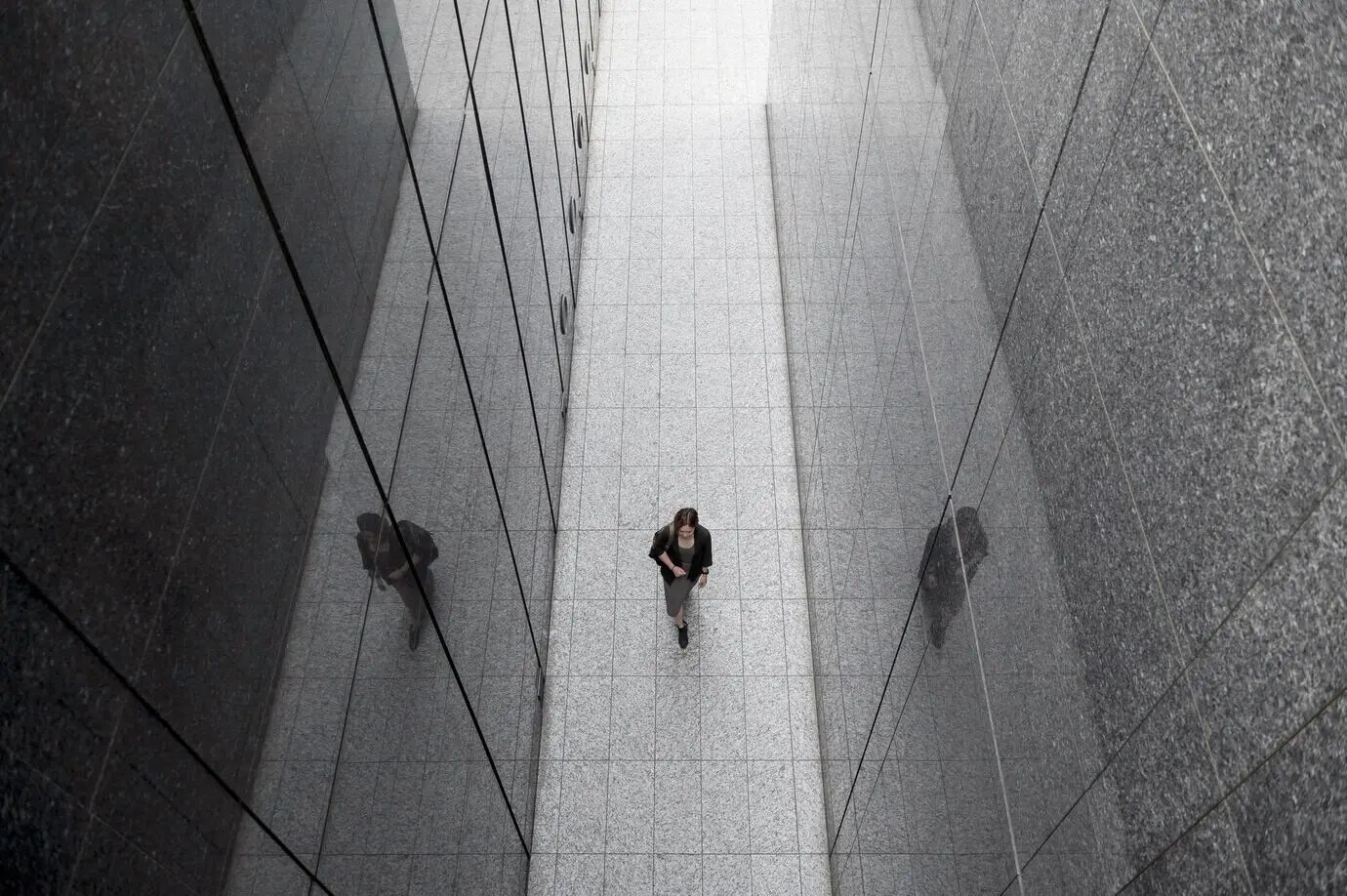 Wide shot of a woman in a modern setting